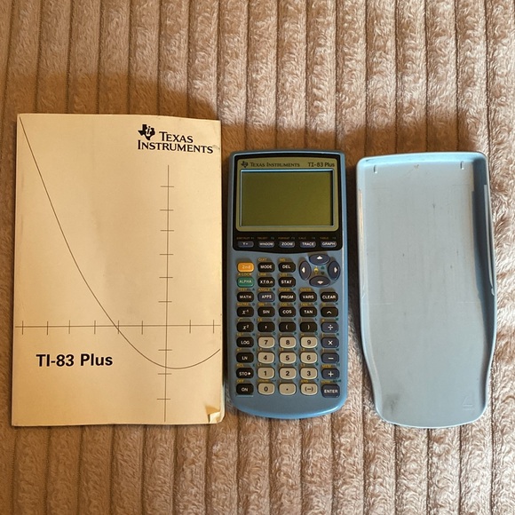 TI-83 Plus Calculator + Manual - Picture 1 of 4